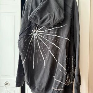 Free People We the Free Black Hoodie with Silver Starburst Design XL NWT